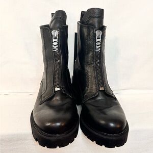 Black DKNY leather boots with a punk vibe. Genuine leather. Size 7.5. New.